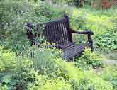 Black-stained wood bench