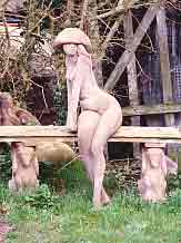 Garden sculpture - girl on seat