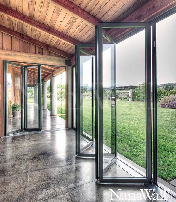 Glass Folding Doors soften the transition from inside to outside