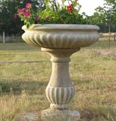 Stone planter on pedestal