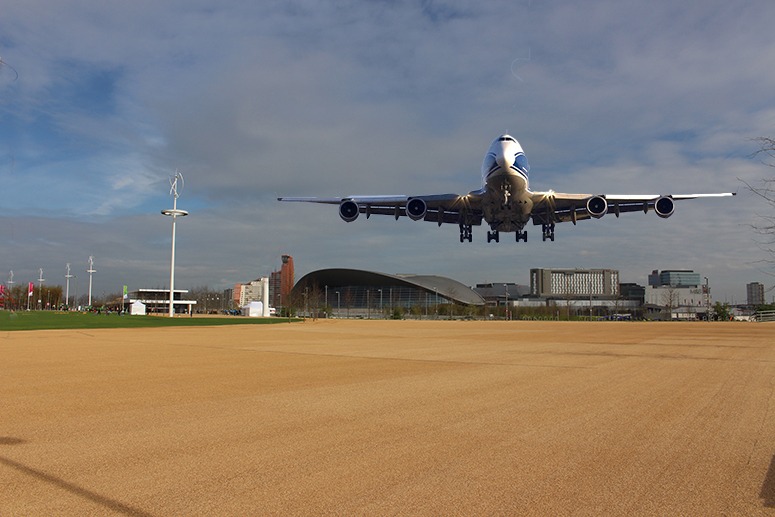First 747 comes in to land on the main runway at London's Olympic Airport